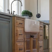 This sink cabinet juts out into the room, bathroom, bathroom accessory, bathroom cabinet, cabinetry, chest of drawers, countertop, cuisine classique, drawer, floor, furniture, hardwood, kitchen, room, sideboard, sink, wood, wood stain, gray, brown