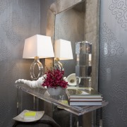 The clear acrylic table in this powder room ceiling, chair, furniture, home, interior design, living room, room, table, wall, gray, black