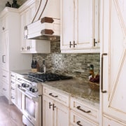 A backsplash with the look of frozen water, cabinetry, countertop, cuisine classique, floor, flooring, home, interior design, kitchen, room, white