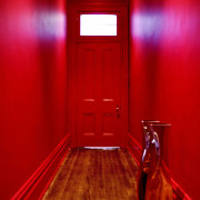 A lively palette of Resene colours has transformed floor, flooring, interior design, light, lighting, red, room, wood, red