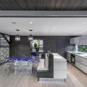 This multi-use space by designer Kim Duffin has architecture, house, interior design, gray