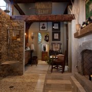 The sunken tub in front of the fireplace home, interior design, wood, brown