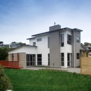 The 250m² show home offers open plan living cottage, elevation, estate, facade, home, house, land lot, property, real estate, residential area, roof, siding, villa