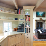 Before this renovation, the casual living room was cabinetry, ceiling, countertop, cuisine classique, floor, flooring, hardwood, home, interior design, kitchen, living room, room, wood, wood flooring, gray, brown