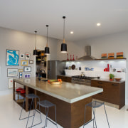 This new kitchen designed by Natalie DuBois features furniture, interior design, kitchen, product design, room, table, gray