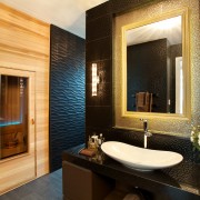 Textural tiles in gold framing the recessed mirror bathroom, estate, home, interior design, room, orange, brown