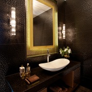 Textural black tiles enhance the glittering look of architecture, bathroom, ceiling, interior design, room, wall, black