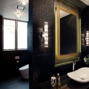 The toilet area is tucked away behind the architecture, bathroom, ceiling, home, interior design, room, window, black