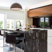 Benchtop with dark and bold stone top with countertop, cuisine classique, furniture, interior design, kitchen, table, white