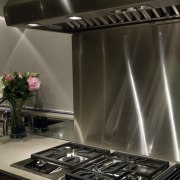 Sleek, contemporary German kitchen - Sleek, contemporary German countertop, home appliance, kitchen, kitchen appliance, kitchen stove, black, gray