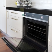 The highly reflective quadruple glazed oven door opens countertop, gas stove, home appliance, kitchen, kitchen appliance, kitchen stove, major appliance, oven, small appliance, white, black