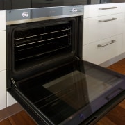 Contemporary kitchen with Smeg appliances - Contemporary kitchen countertop, gas stove, home appliance, kitchen, kitchen appliance, kitchen stove, major appliance, microwave oven, oven, black