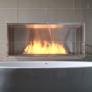 With glittering reflections, dancing flames and smooth textures, fireplace, hearth, heat, wood burning stove, gray