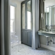 The exposed pipework beneath the vanity in this bathroom, bathroom accessory, bathroom cabinet, floor, flooring, home, interior design, room, window, gray
