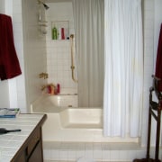 Before image of bathroom by Mark Williams - bathroom, curtain, floor, flooring, home, interior design, plumbing fixture, room, textile, tile, window, window treatment, gray