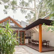 Reminiscent of a Japanese courtyard house, this renovated backyard, cottage, estate, home, house, property, real estate, roof