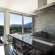 This kitchen features countertops in Atlantis from the architecture, daylighting, house, interior design, property, real estate, white, black