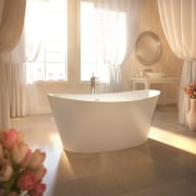 Resort-style bathing is all about the feel-good factor. bathroom, bathroom sink, bathtub, ceramic, floor, flooring, interior design, plumbing fixture, room, sink, tap, tile, orange, brown, white