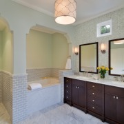 The toilet also has its own alcove with architecture, bathroom, cabinetry, ceiling, countertop, estate, floor, flooring, home, interior design, kitchen, real estate, room, tile, wall, gray