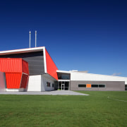 Hobsonville Point Secondary School, by ASC Architects, comprises architecture, facade, house, real estate, sky, blue, brown