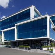 Watercare House in Newmarket boasts a strong street architecture, building, commercial building, corporate headquarters, elevation, facade, headquarters, mixed use, property, real estate, sky, blue