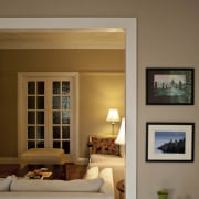 Resene Sandcastle creates a warm, relaxing living area. ceiling, furniture, home, interior design, living room, room, table, wall, window, wood, brown