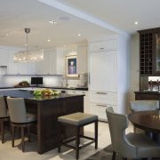 Paneled kitchen with canoe chandelier, subway tile backsplash, ceiling, countertop, dining room, interior design, kitchen, living room, real estate, room, gray, black