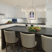 Paneled kitchen with canoe chandelier, subway tile backsplash, cabinetry, countertop, cuisine classique, interior design, kitchen, real estate, room, gray