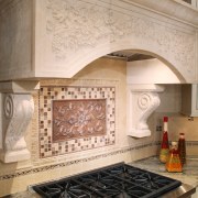 A kitchen from Kitchen Distributors responds to the countertop, fireplace, floor, flooring, hearth, interior design, kitchen, tile, orange, brown