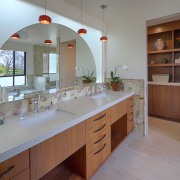 Architect Linda Brettler teamed flush walnut cabinetry with cabinetry, countertop, home, interior design, kitchen, real estate, room, gray