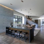 The interior of this mountain home designed by architecture, ceiling, countertop, dining room, estate, floor, flooring, house, interior design, kitchen, real estate, room, table, gray