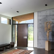 The entry to this mountain home  by architecture, ceiling, daylighting, floor, flooring, house, interior design, lobby, wood, wood flooring, gray