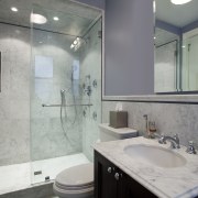 This master bathroom reflects the refined aesthetics of architecture, bathroom, home, interior design, property, room, sink, gray