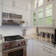 Full-height wraparound cabinets help this compact kitchen deliver cabinetry, countertop, cuisine classique, home appliance, interior design, kitchen, kitchen appliance, kitchen stove, major appliance, oven, room, gray