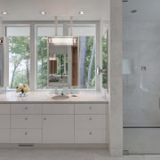 This new shower in a master suite addition bathroom, bathroom accessory, bathroom cabinet, cabinetry, countertop, floor, home, interior design, kitchen, room, sink, gray