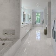 Reflective surfaces were specified to create a tranquil, bathroom, estate, floor, flooring, home, interior design, plumbing fixture, property, real estate, room, tile, wall, gray