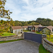 Warm welcome  a cedar weatherboard gate and cottage, estate, home, house, property, real estate, tree, yard, brown, white
