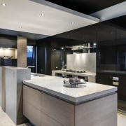 There is a blade ceiling in this kitchen, countertop, cuisine classique, interior design, kitchen, real estate, gray, black