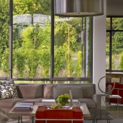 Sitting area in country house with glass walls home, house, interior design, living room, table, window