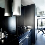 It's the appliances that enliven Greg Natale's galley architecture, countertop, interior design, kitchen, product design, black, white