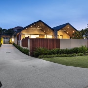 Contemporary home renovation with gabled roof forms architecture, cottage, estate, facade, home, house, landscape, neighbourhood, property, real estate, residential area, sky, suburb, villa, gray, teal