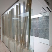 This electric glass screen can turn opaque at architecture, daylighting, floor, glass, handrail, interior design, lobby, gray
