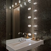 Hollywood lights in this powder room are a architecture, bathroom, ceiling, daylighting, flooring, interior design, light fixture, lighting, tile, wall, black