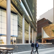 Paving with alternating bands of light and dark architecture, building, commercial building, condominium, corporate headquarters, daylighting, facade, lobby, metropolitan area, mixed use, gray, white