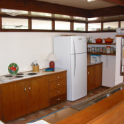 Wood featured in the existing kitchen of this cabinetry, countertop, cuisine classique, hardwood, interior design, kitchen, real estate, room, wood, brown, white