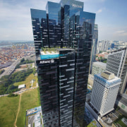 Occupying the top 15 floors of a new aerial photography, bird's eye view, building, city, cityscape, commercial building, condominium, corporate headquarters, daytime, downtown, headquarters, metropolis, metropolitan area, mixed use, neighbourhood, real estate, residential area, sky, skyline, skyscraper, tower, tower block, urban area, urban design, gray, black