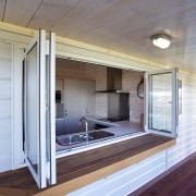 Serving hatch from kitchen to deck on Lockwood architecture, house, interior design, wood, gray