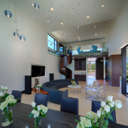 A spiral staircase near the entry leads up ceiling, interior design, living room, lobby, gray