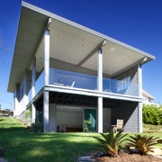 This 1950s bach has undergone a major transformation architecture, home, house, blue