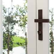 Chant customisable residential door handle in Weathered Brass door, home, window, wood, white